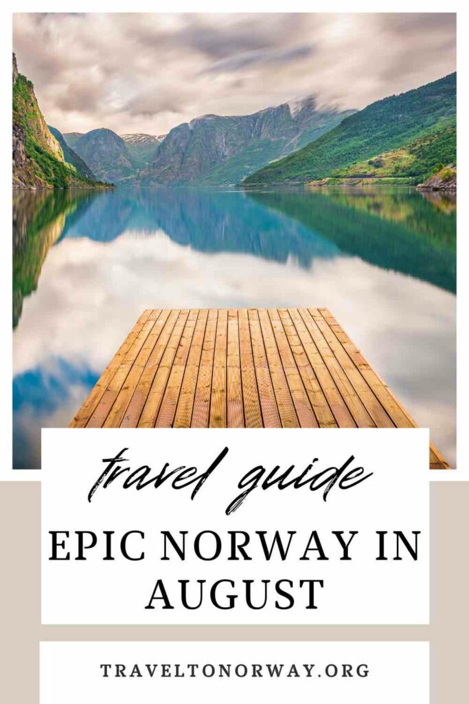 a blank beautiful fjord with green mountain sides on both shores, under a white cloudy sky, with a wooden jetty in front